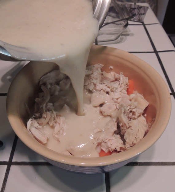 adding white sauce